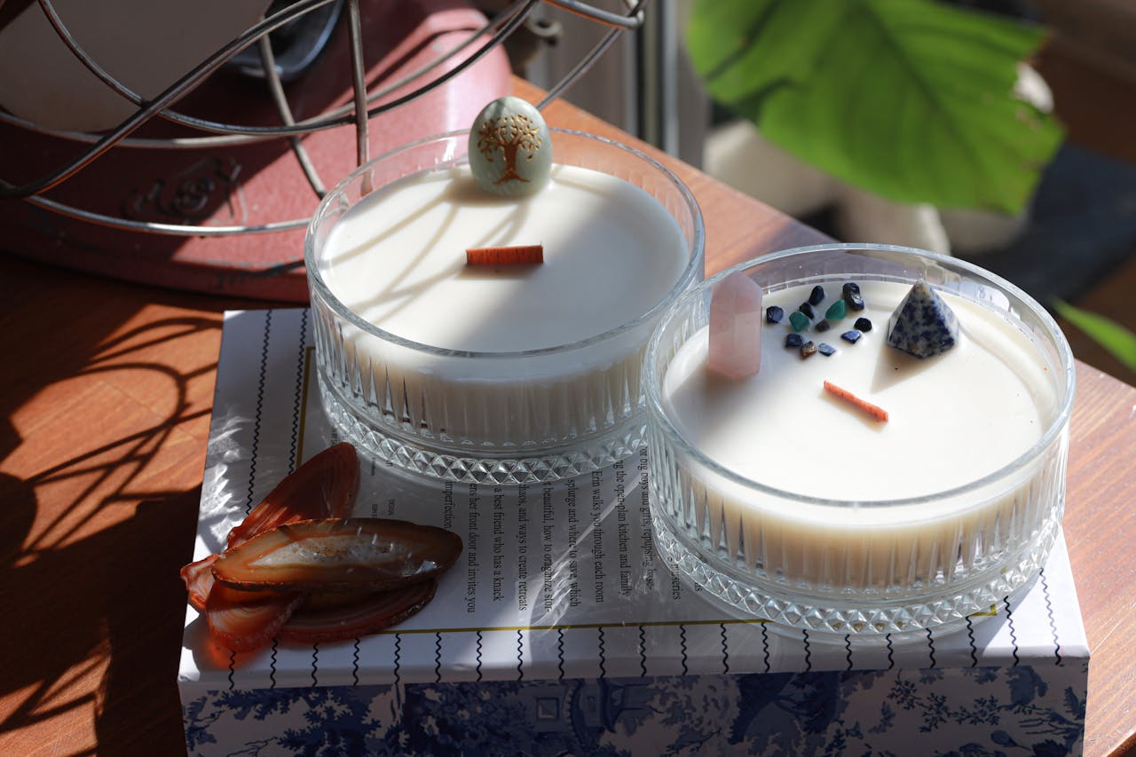 services-03 Two exquisite homemade candles decorated with artistic elements, perfect for home decor inspiration.